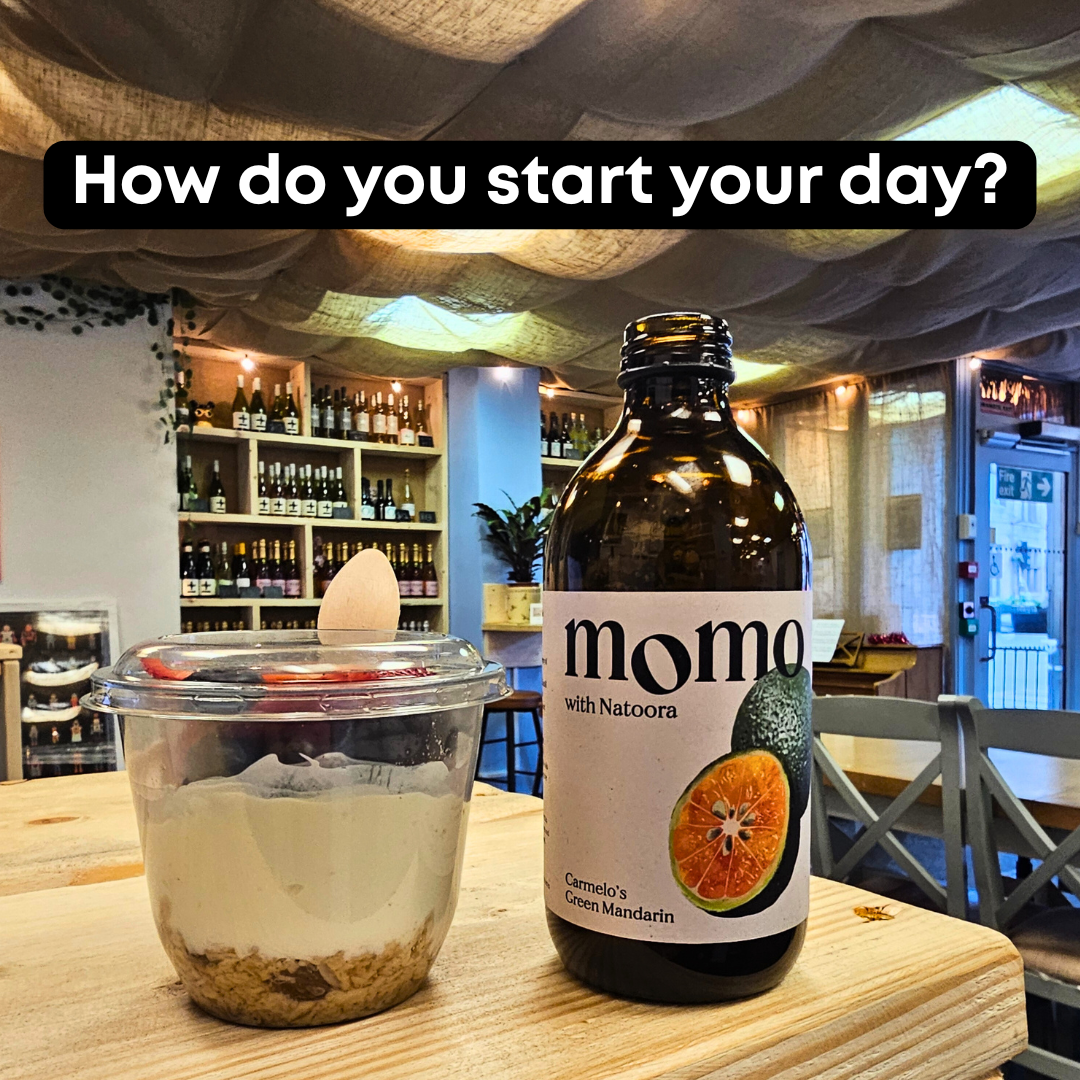 Bottle of Momo Komhucha on a table at Otleys Komhucha and non-alcoholic tap room.