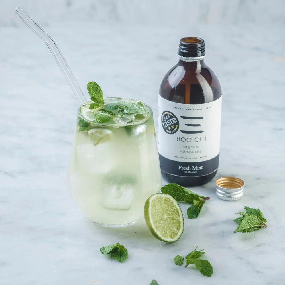 Boo Chi Fresh Mint Kombucha next to a mojito cocktail at Functional Drinks Club in Otley.