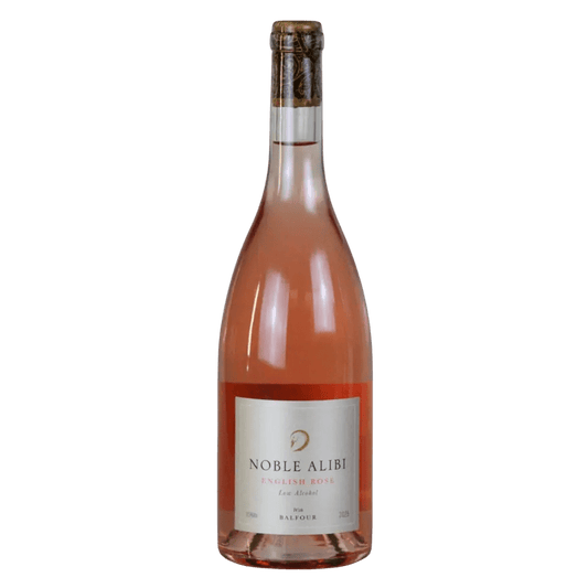 A bottle of Noble Alibi English Rosé wine with a pale pink liquid, a white label with gold and red text, and a dark foil neck seal, isolated on a white background.
