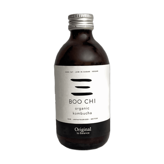 Boo Chi Original raw kombucha in an amber 330ml glass bottle with a silver cap and a white label with a black flavour band.