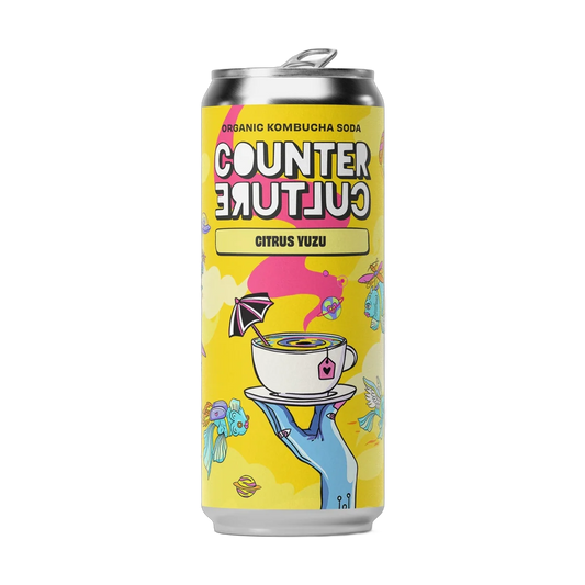 Counter Culture Citrus Yuzu raw kombucha in a 330ml can with a silver cap and a bright yellow illustrated label.