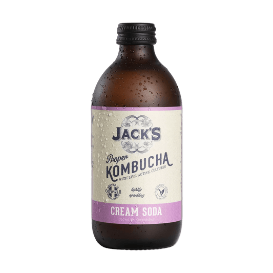 Jack's Cream Soda raw kombucha in an amber 330ml glass bottle with a black cap and a cream label with a lilac flavour band.