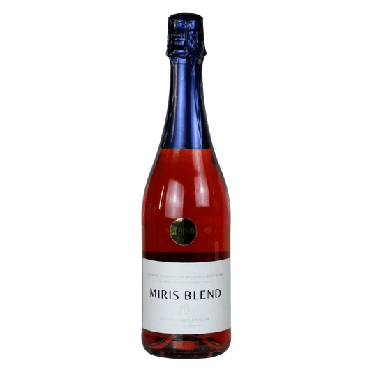 A bottle of Miris Blend 18 Fermented Peach Grape Soda, featuring a white label, a deep red liquid, a dark blue foil neck, and a blue foil cap, set against a plain white background.
