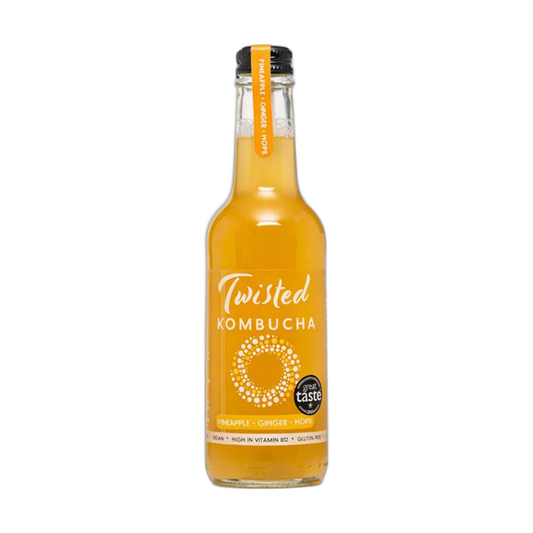 Twisted Pineapple, Ginger & Hops raw kombucha in a clear 330ml glass bottle with a black cap and a golden yellow label with an orange neck tag.