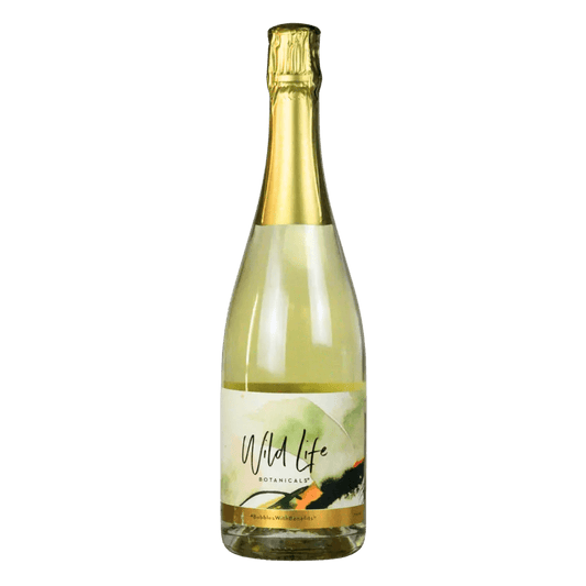 A bottle of Wild Life Botanicals Non-Alcoholic Sparkling Water with lemon verbena, featuring a gold foil neck and a white label with green and orange botanical illustrations, set against a plain white background.